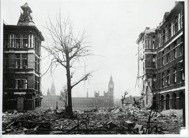 Bomb damage at St Thomas Hospital with Westminster, across the Thames River, in the background.